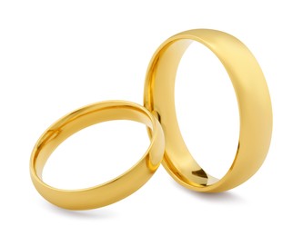 Photo of Beautiful golden wedding rings isolated on white