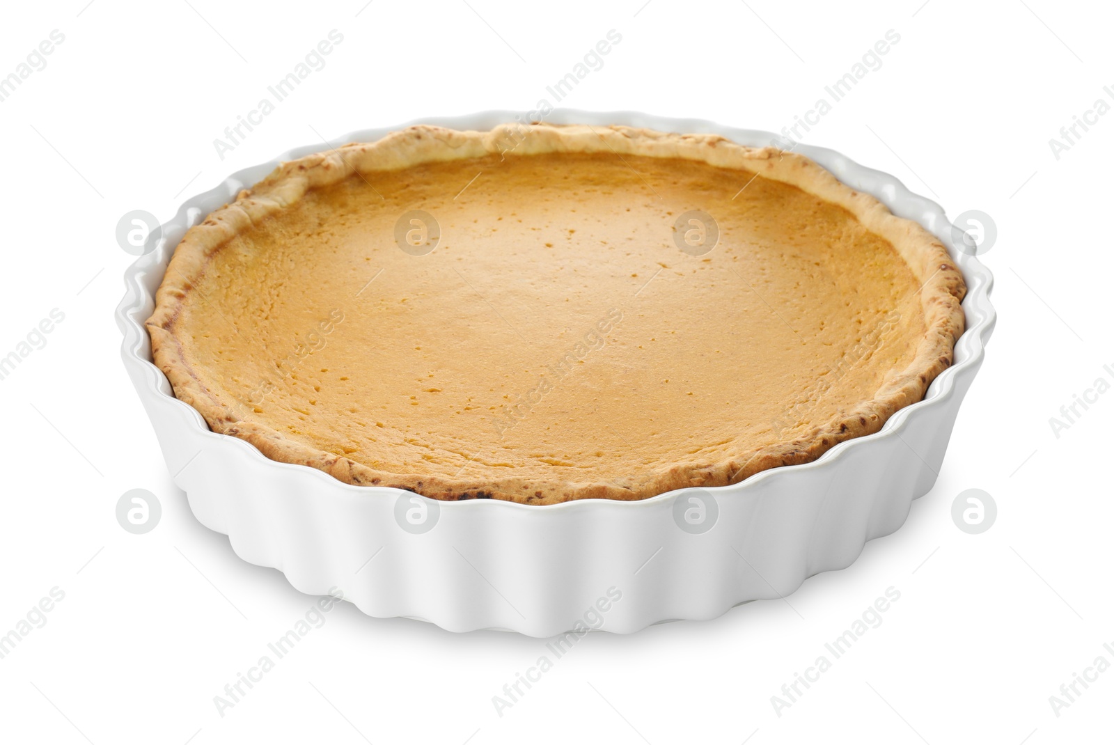 Photo of Tasty homemade pumpkin pie in baking dish isolated on white