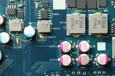 Electronic circuit board as background, top view