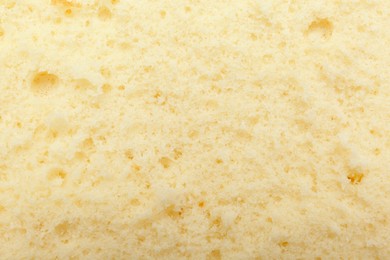 Photo of Tasty sponge cake as background, top view