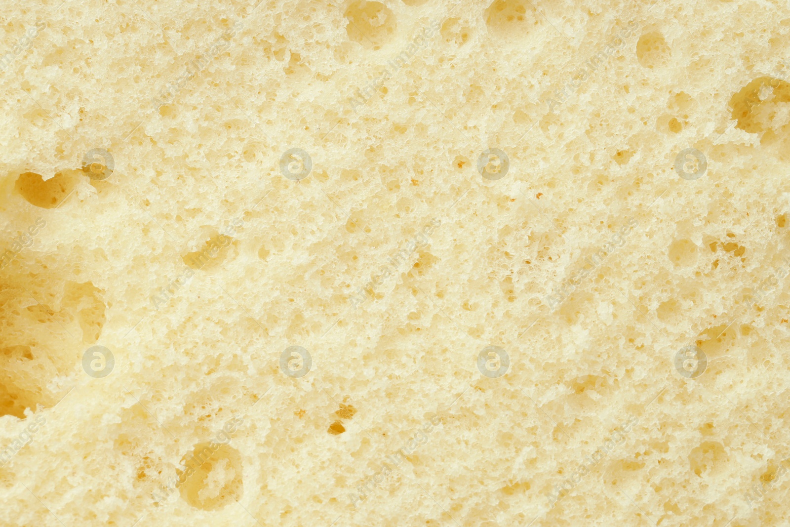 Photo of Tasty sponge cake as background, top view