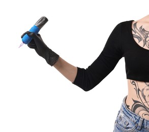 Photo of Professional artist in gloves holding tattoo machine on white background, closeup