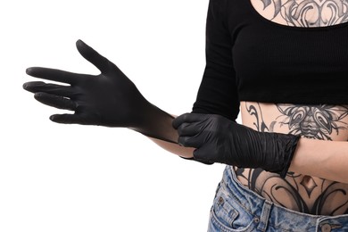 Professional tattoo artist wearing gloves on white background, closeup