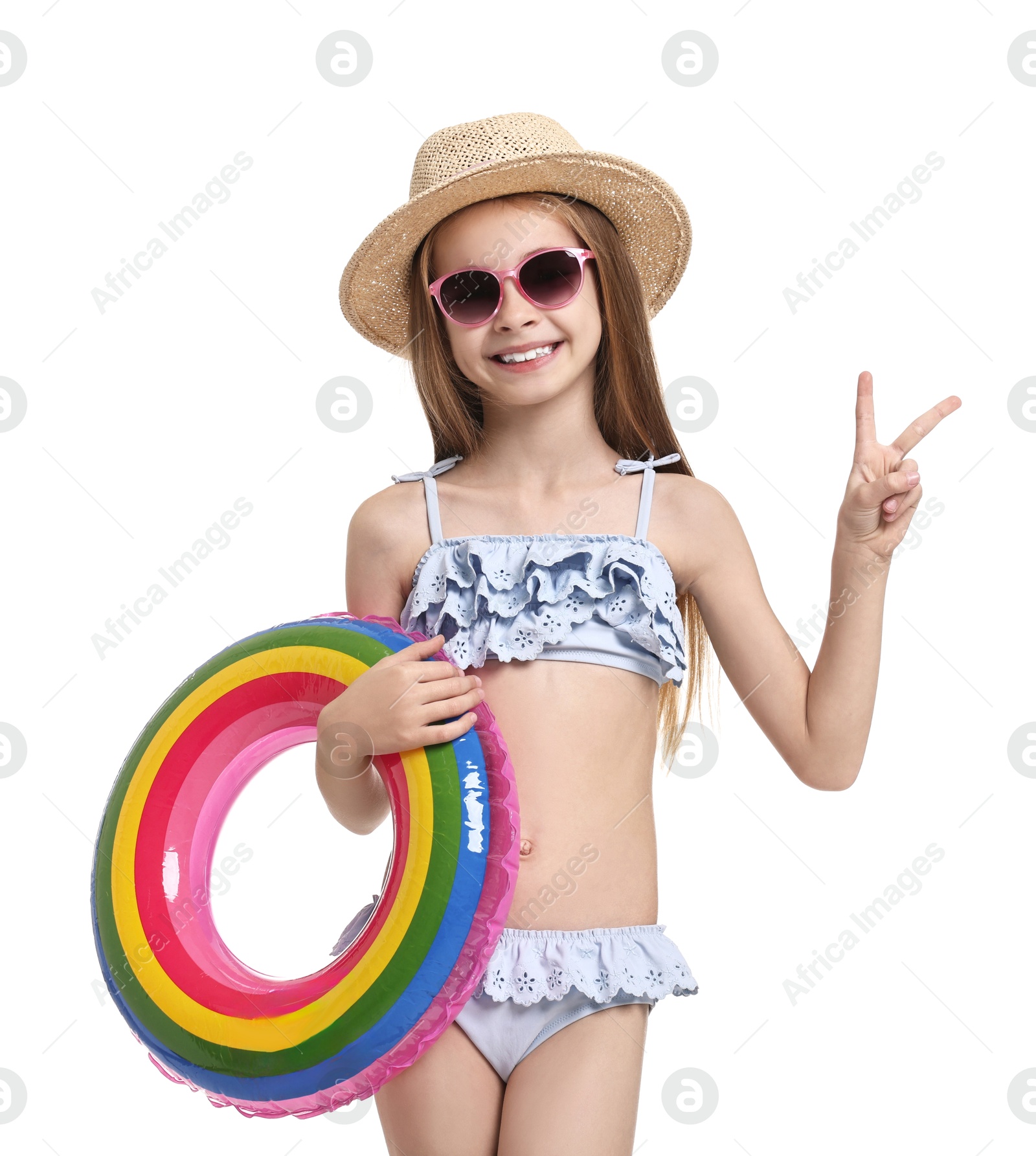 Photo of Little girl in beachwear with inflatable ring on white background