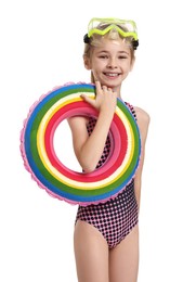 Photo of Happy girl in beachwear with diving mask and inflatable ring on white background