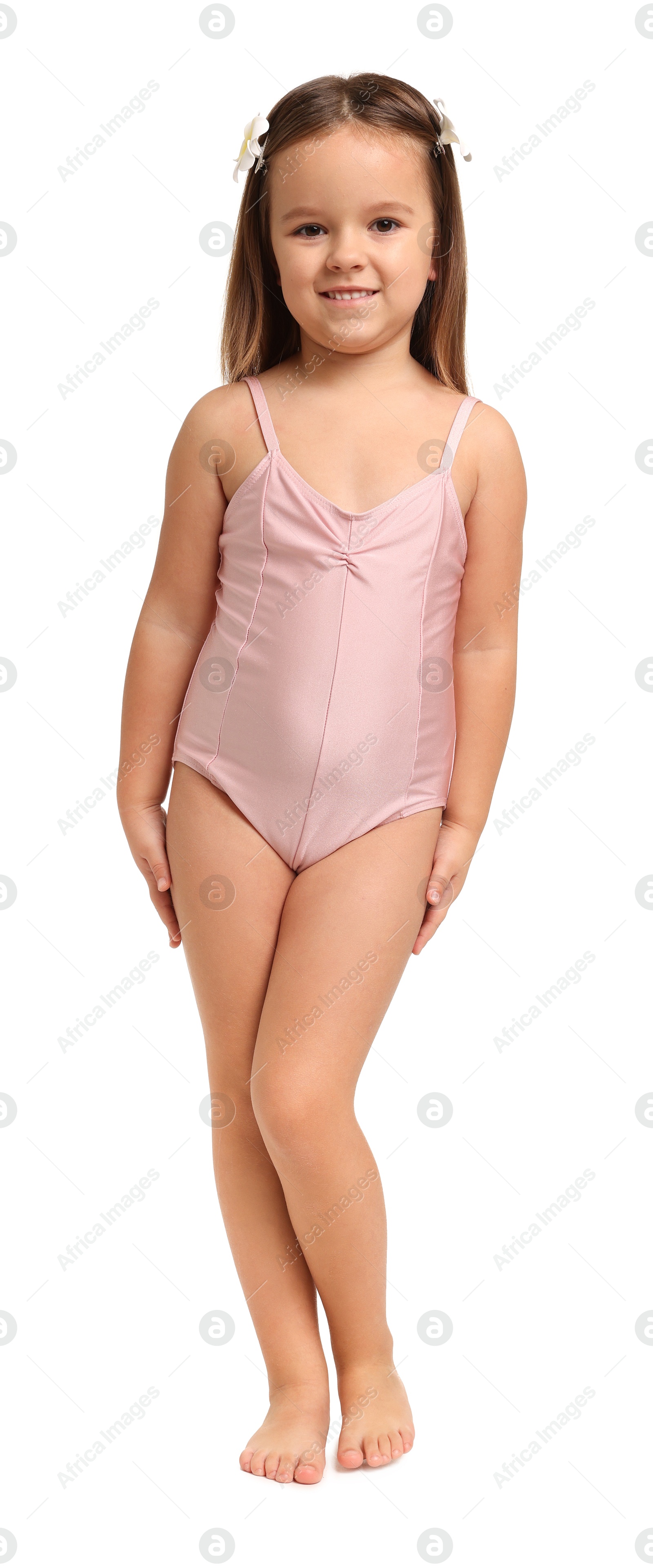 Photo of Cute little girl in swimsuit on white background