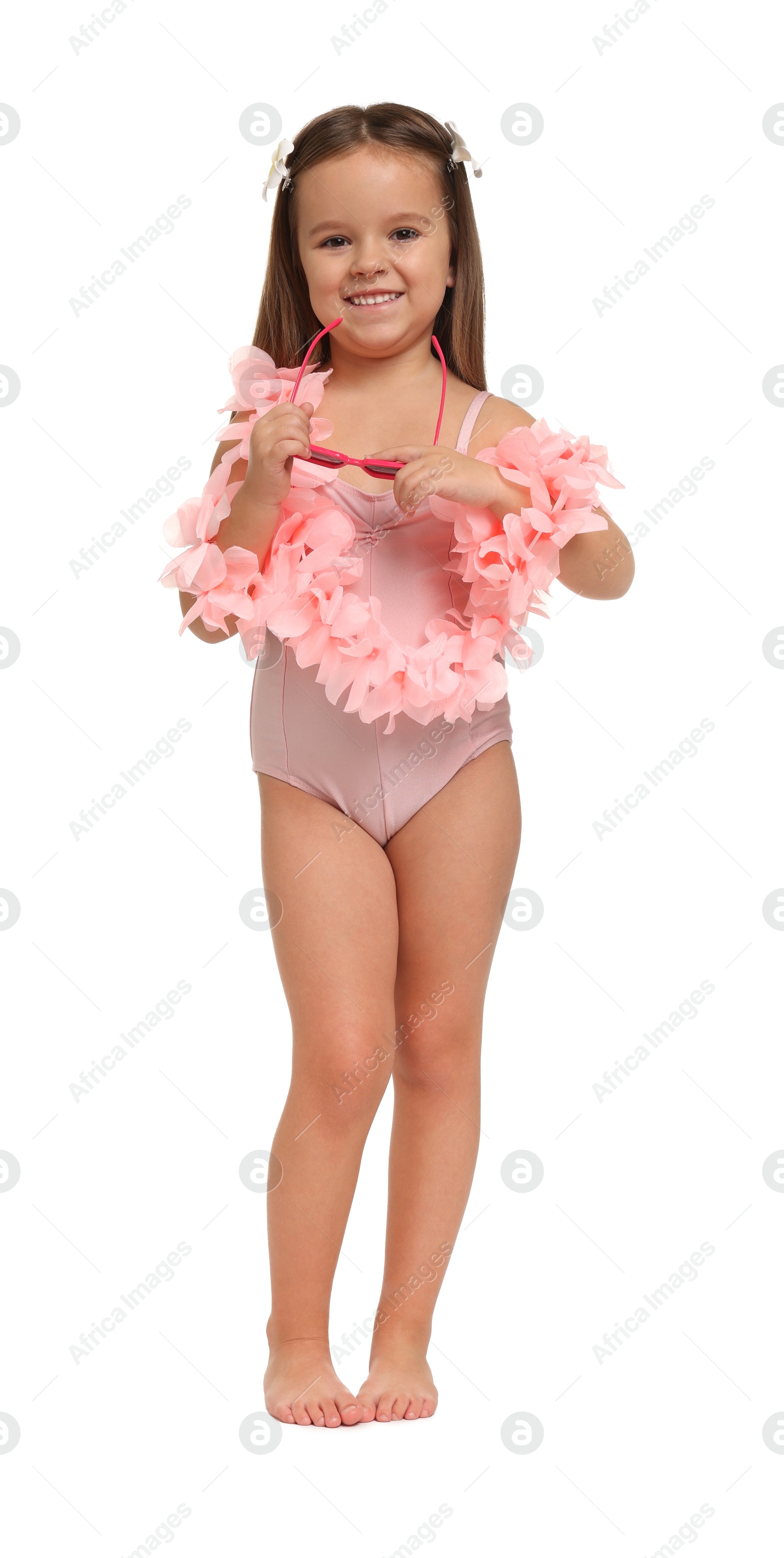 Photo of Cute little girl in swimsuit on white background