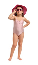 Cute little girl in swimsuit with hat on white background