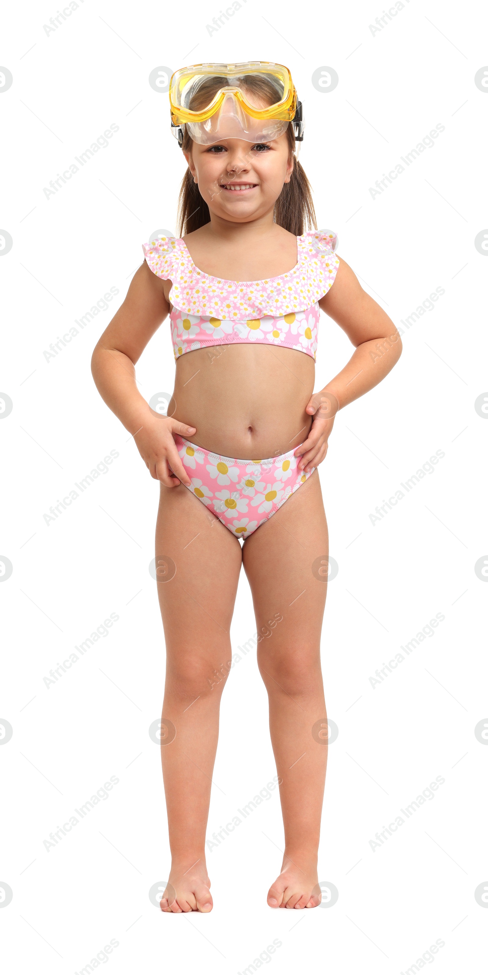 Photo of Cute little girl in swimsuit with mask on white background