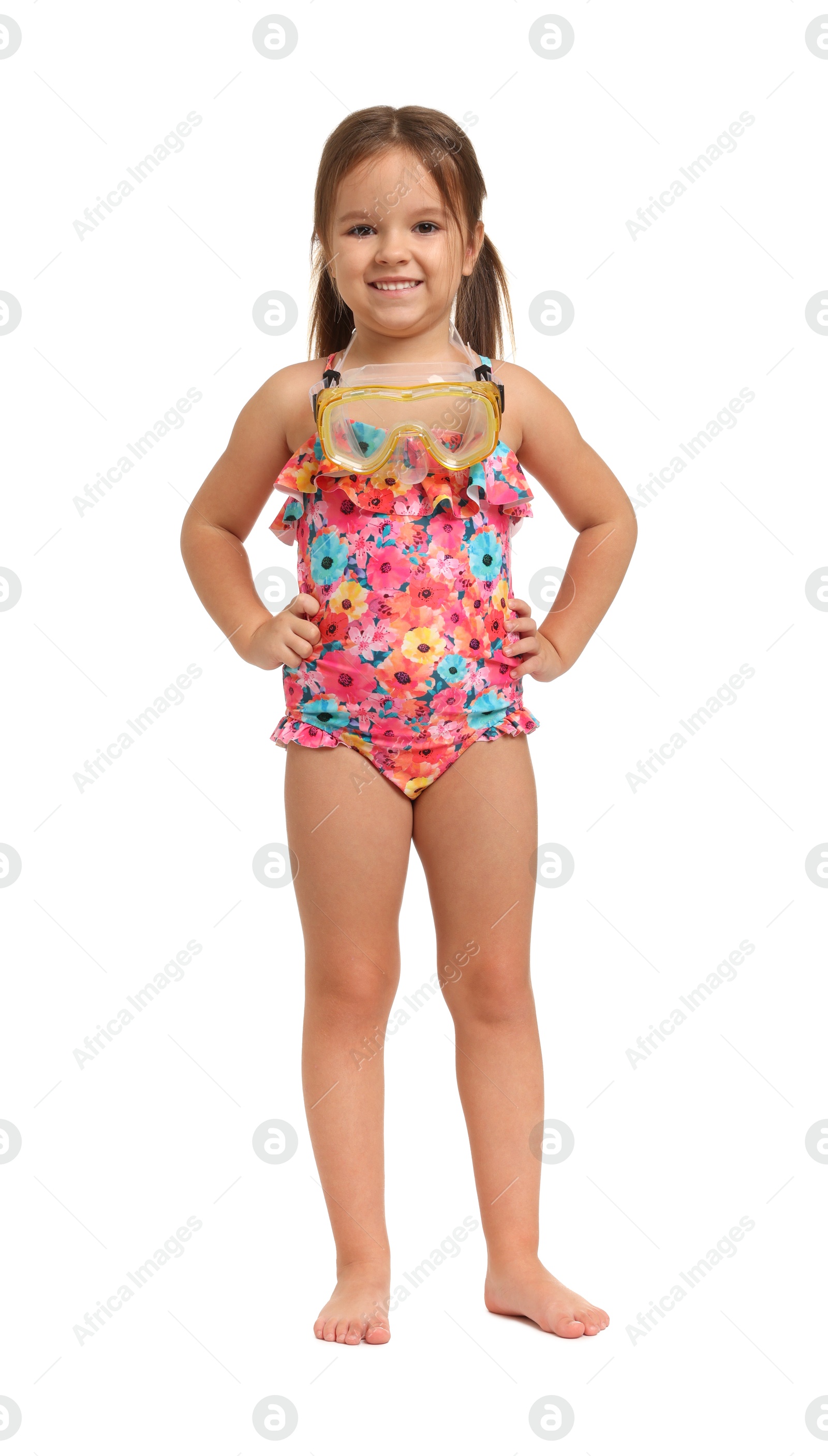 Photo of Cute little girl in swimsuit with mask on white background