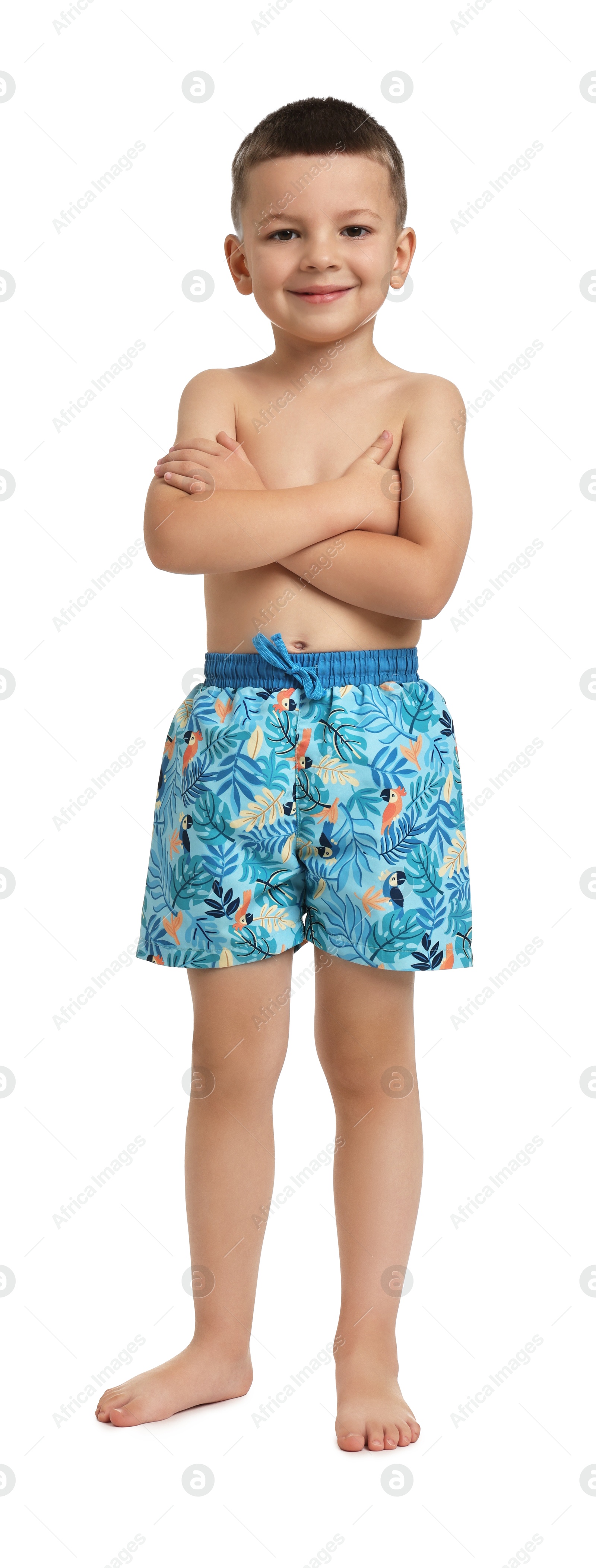 Photo of Cute little boy in beachwear on white background