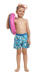 Photo of Cute little boy in beachwear with inflatable ring on white background