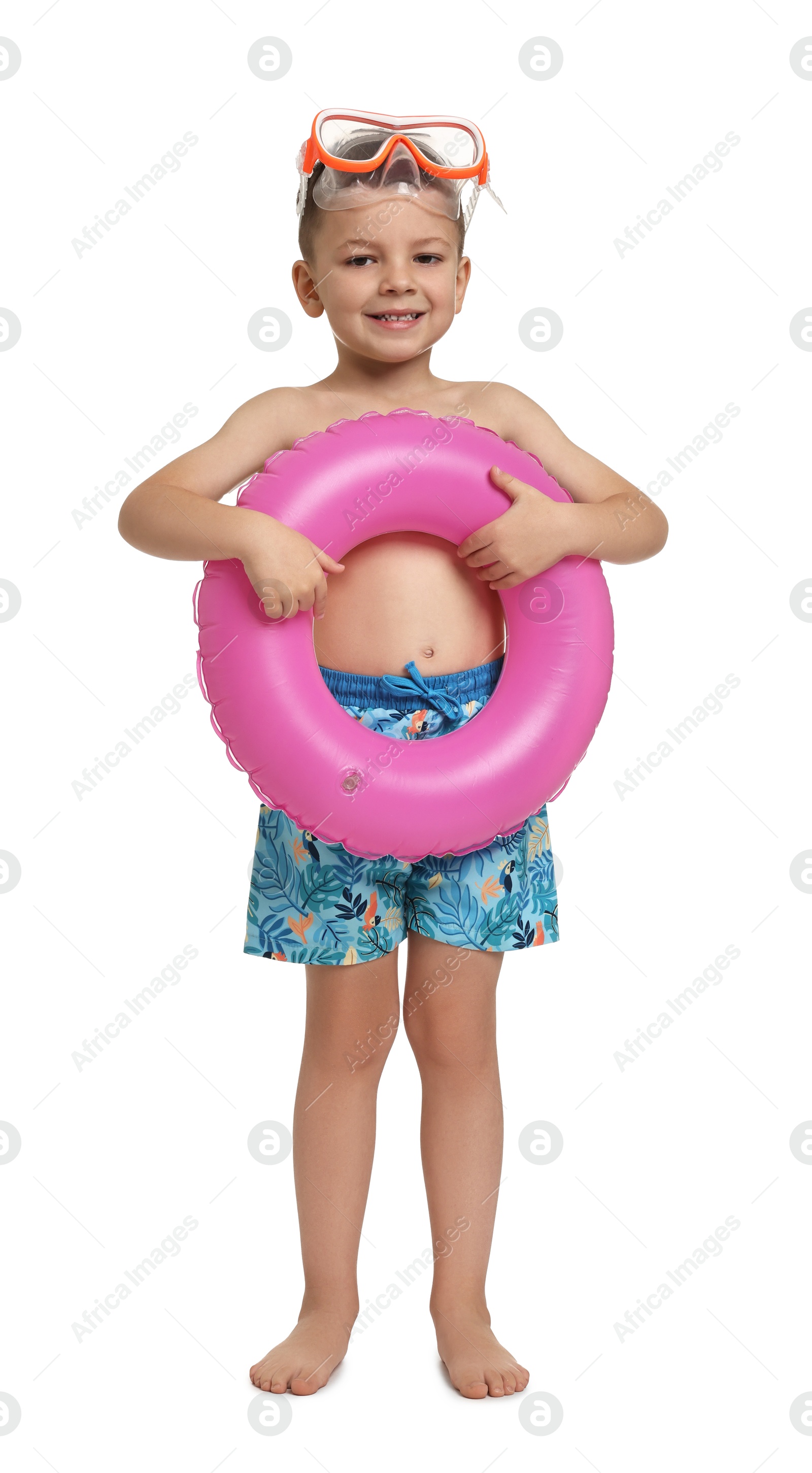 Photo of Cute little boy in beachwear with inflatable ring on white background