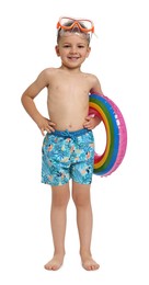 Photo of Cute little boy in beachwear with inflatable ring on white background