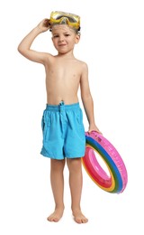 Photo of Cute little boy in beachwear with inflatable ring and diving mask on white background