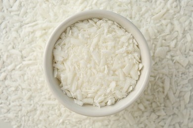 Photo of Soy wax in bowl on pile, top view