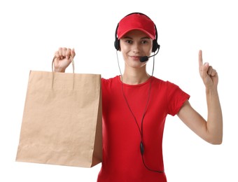 Fast-food worker with paper bag on white background