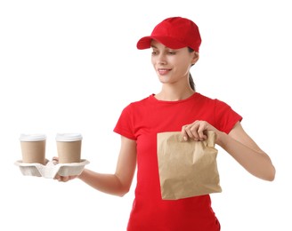 Photo of Fast-food worker with paper cups and bag on white background