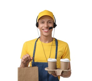 Photo of Fast-food worker with paper bag and cups on white background