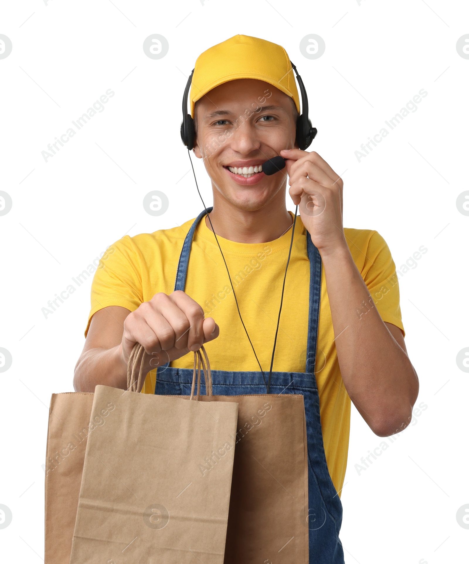 Photo of Fast-food worker with paper bags on white background