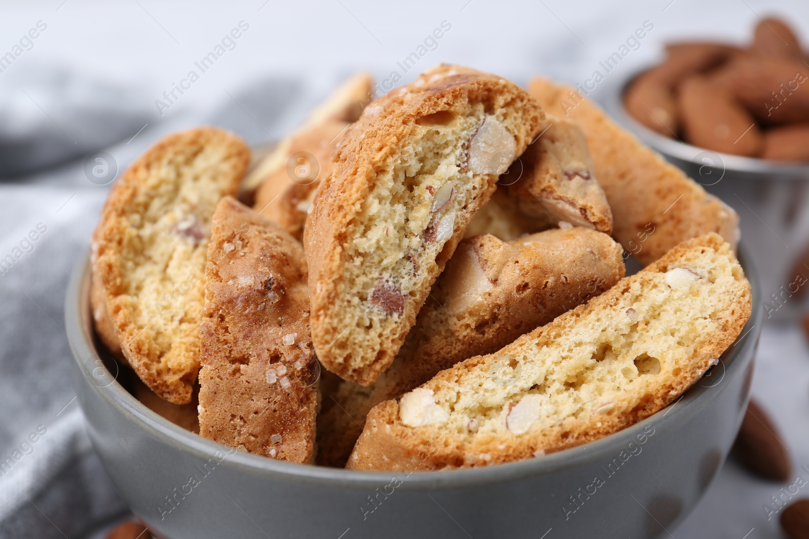 Photo of Tasty almond biscuits (Cantuccini) in bowl, closeup