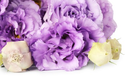 Photo of Bouquet of beautiful violet eustoma flowers isolated on white