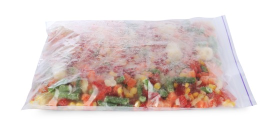 Photo of Mix of frozen vegetables in plastic bag isolated on white