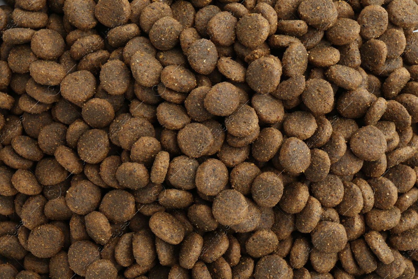 Photo of Pet food granules as background, top view