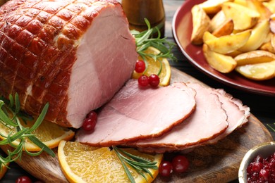 Christmas food. Tasty baked ham served on table, closeup