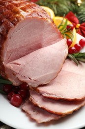 Christmas food. Tasty baked ham served on table, closeup