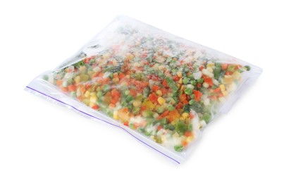 Photo of Mix of frozen vegetables in plastic bag isolated on white