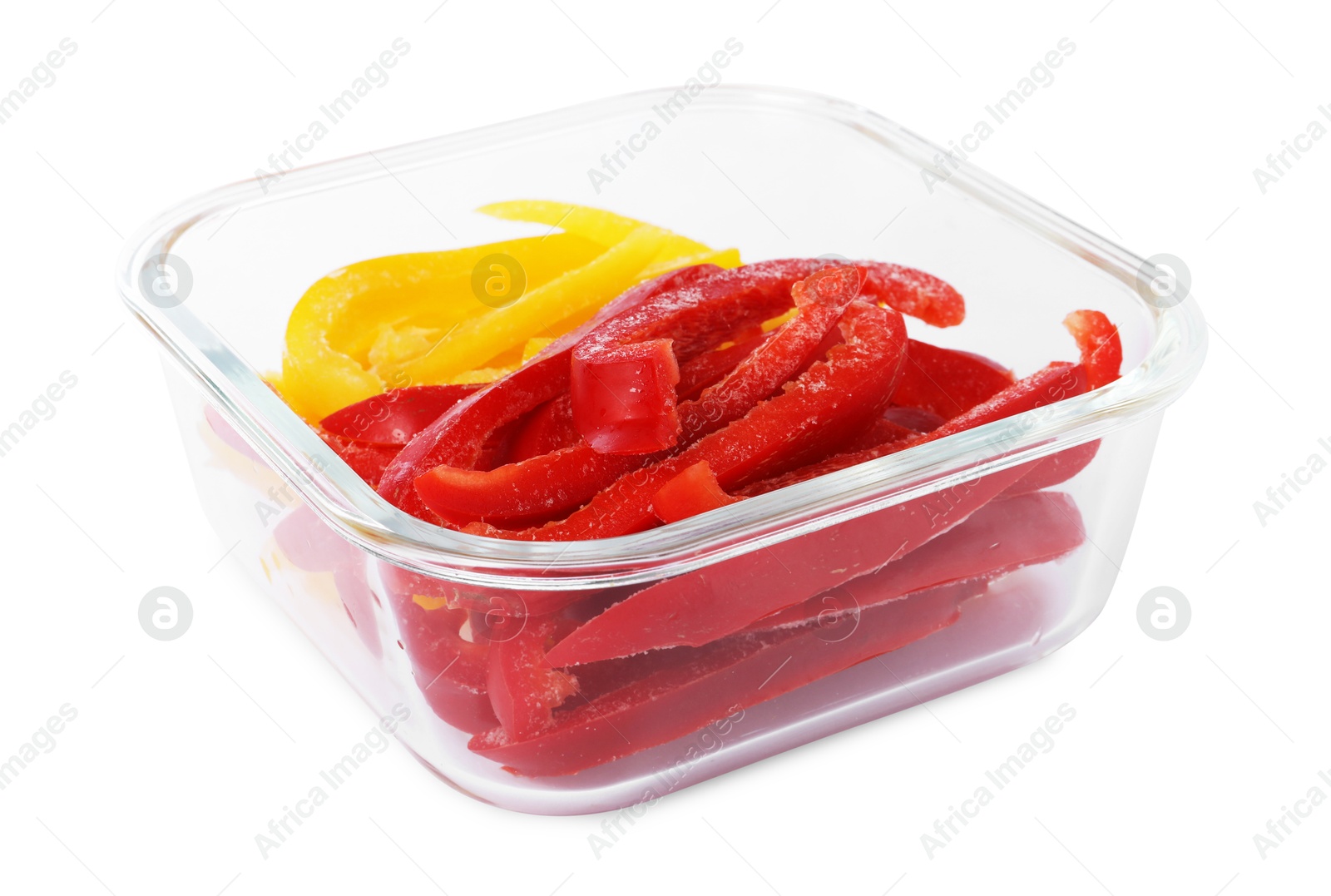 Photo of Pieces of frozen bell peppers in container isolated on white