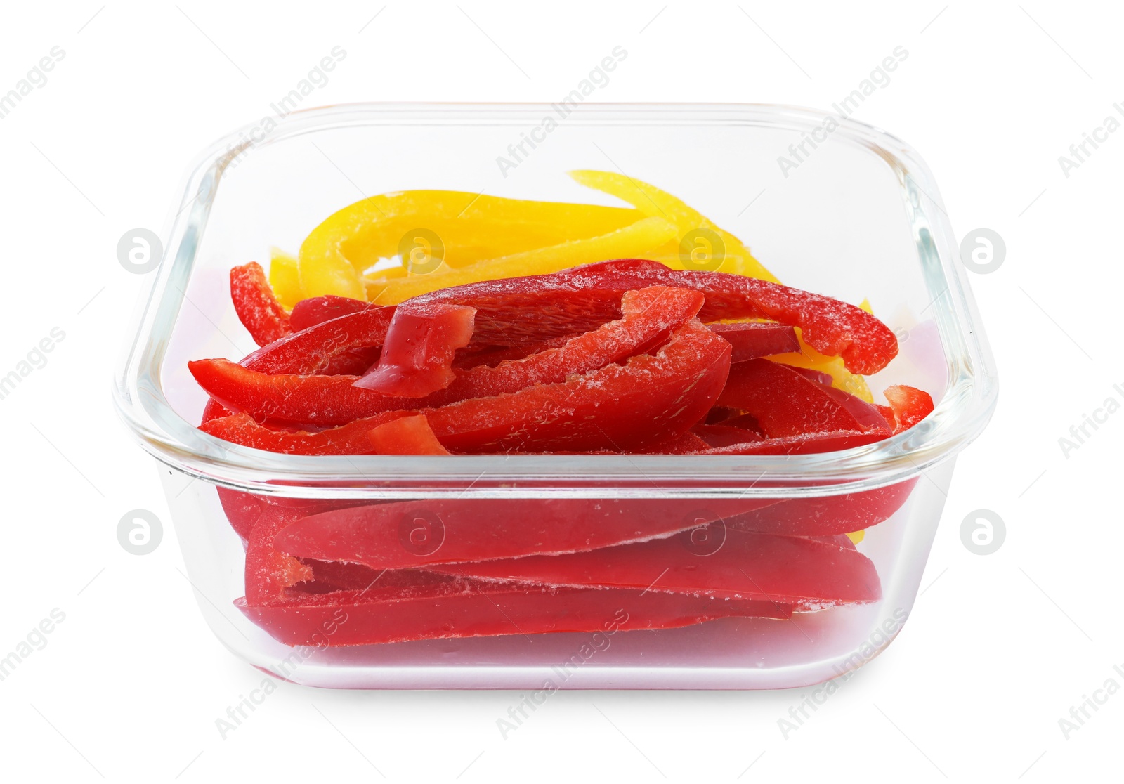 Photo of Pieces of frozen bell peppers in container isolated on white