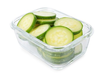 Photo of Slices of frozen zucchini in container isolated on white