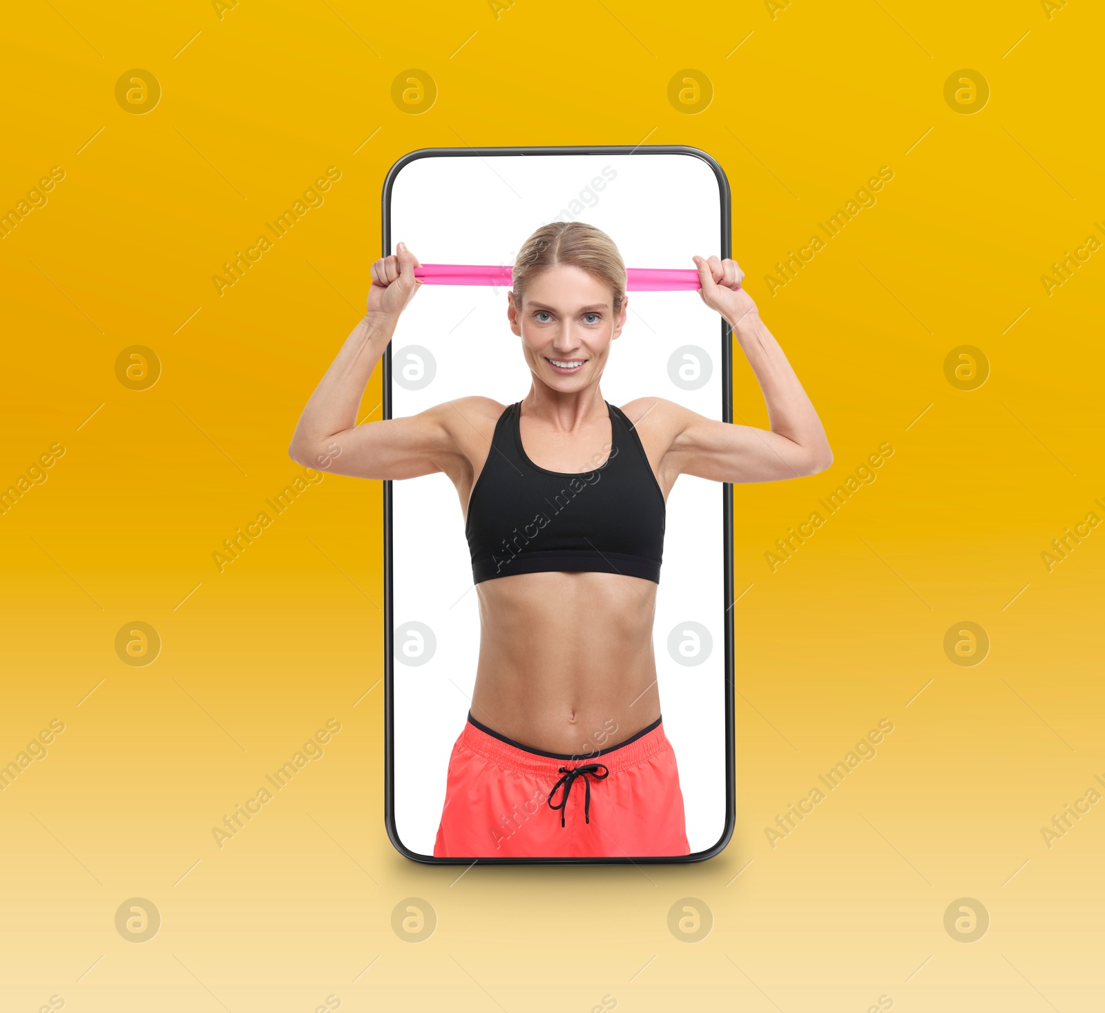 Image of Personal trainer online. Woman with elastic resistance band transcending out of mobile phone screen on golden gradient background