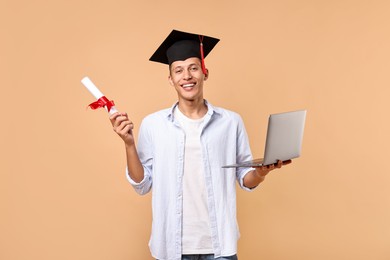 Photo of Happy student with diploma and laptop after graduation on beige background