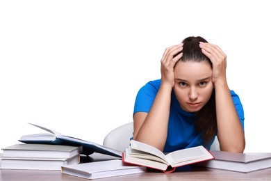 Photo of Young student with books having stress before exam at wooden table isolated on white