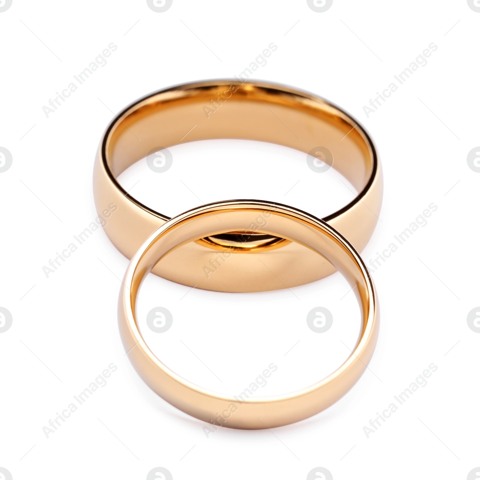 Photo of Beautiful golden wedding rings isolated on white