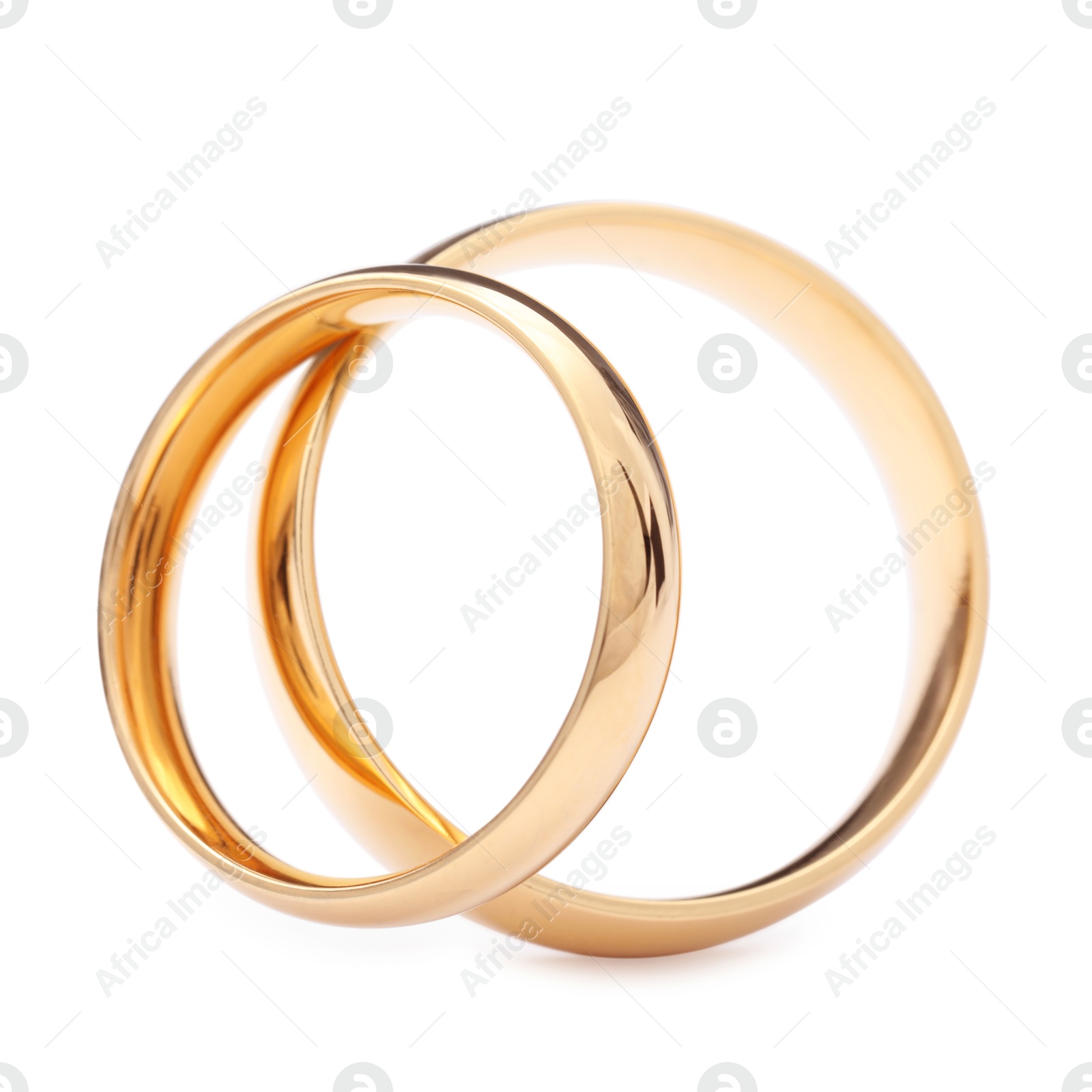 Photo of Beautiful golden wedding rings isolated on white