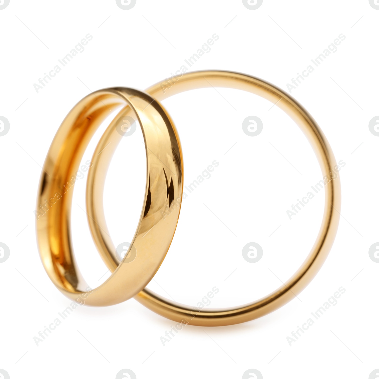 Photo of Beautiful golden wedding rings isolated on white