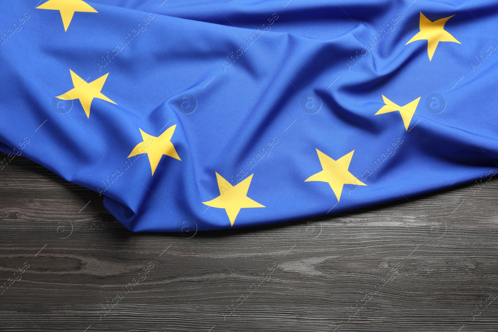 Photo of Flag of European Union on wooden background