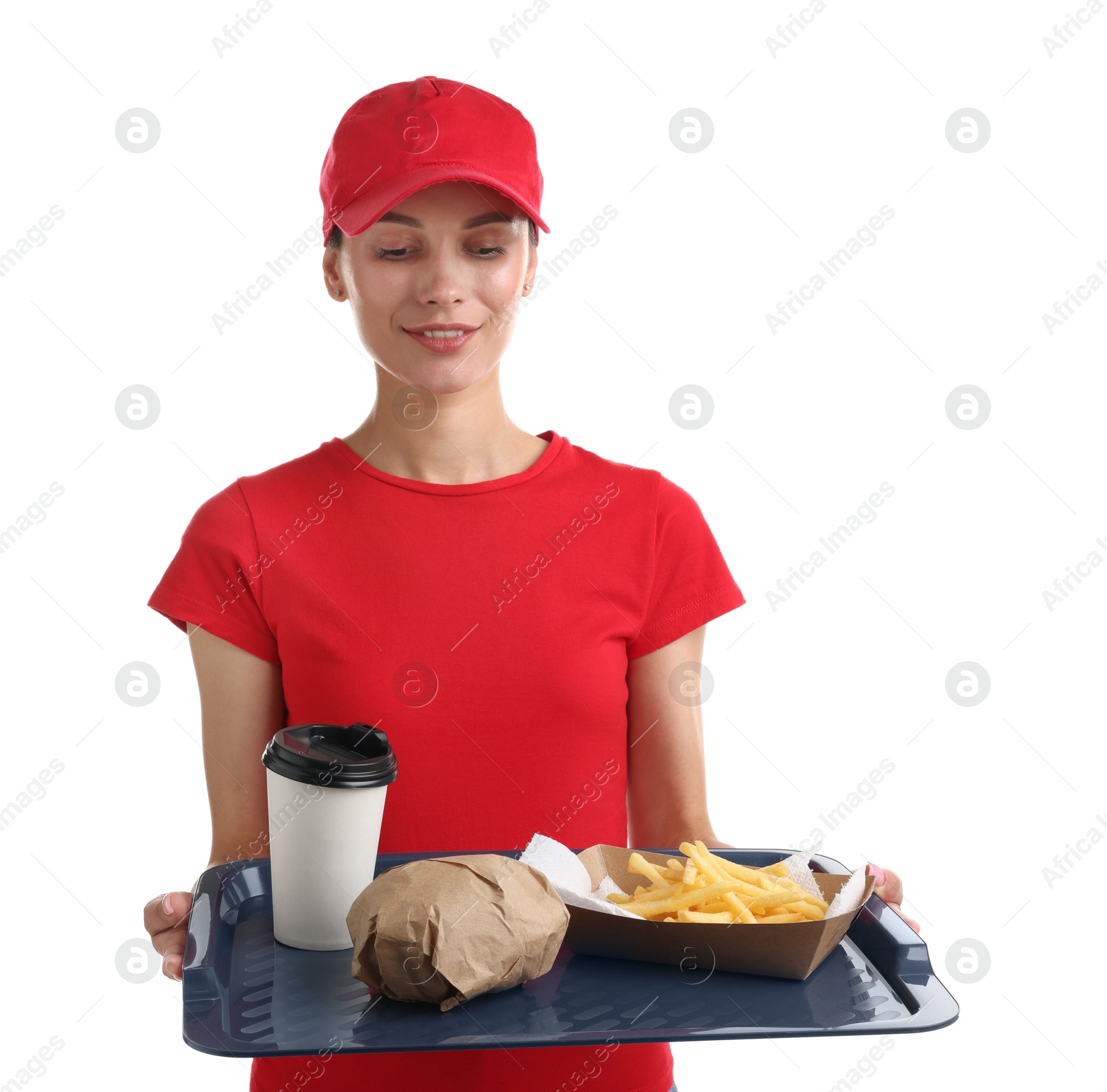 Photo of Fast-food worker holding tray with order on white background