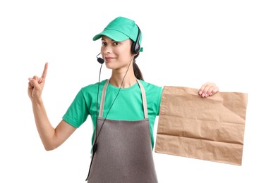 Photo of Fast-food worker with paper bag on white background