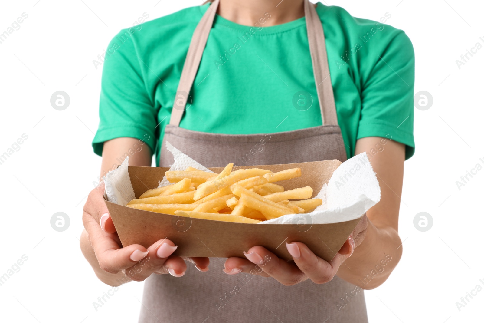 Photo of Fast-food worker holding paper container with fries on white background, closeup