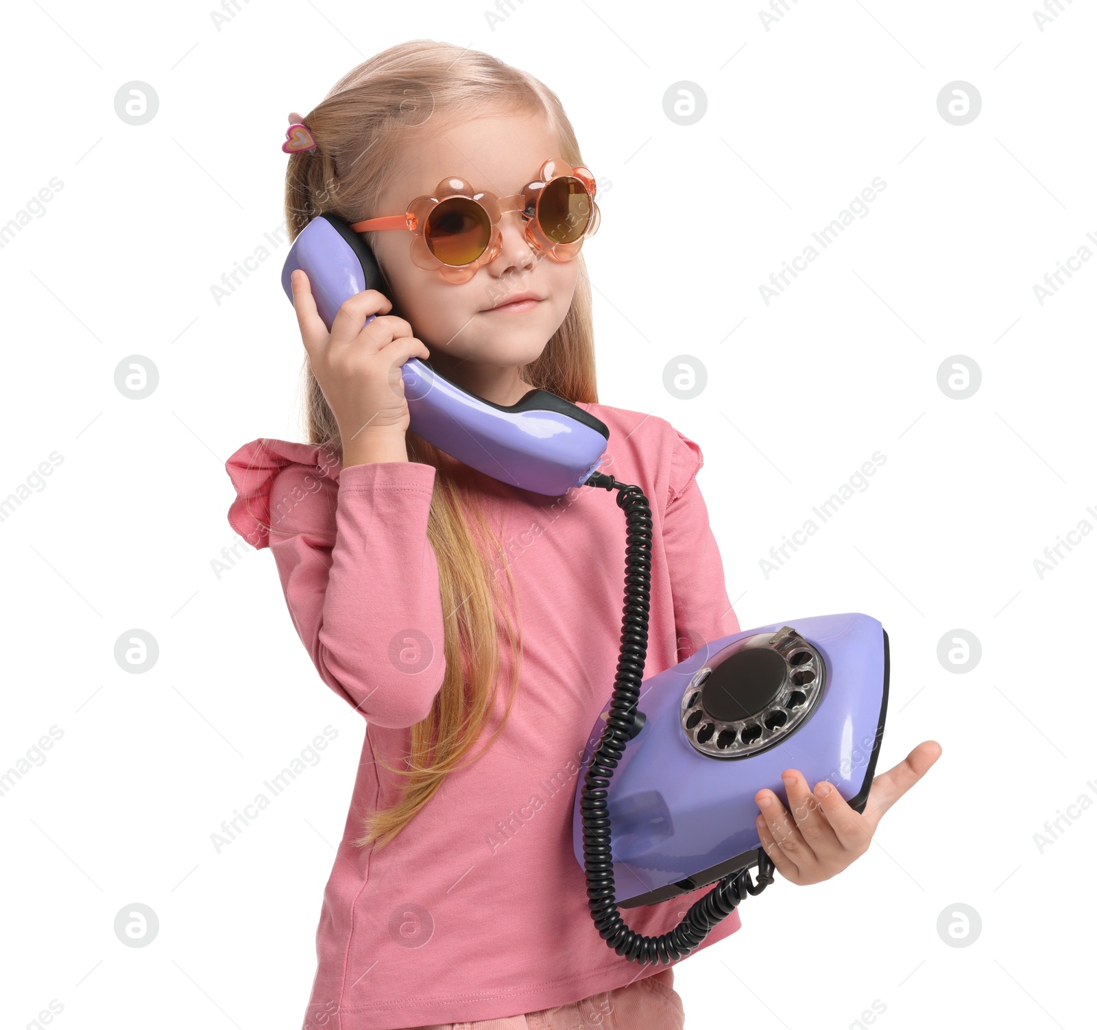 Photo of Cute little girl with telephone on white background