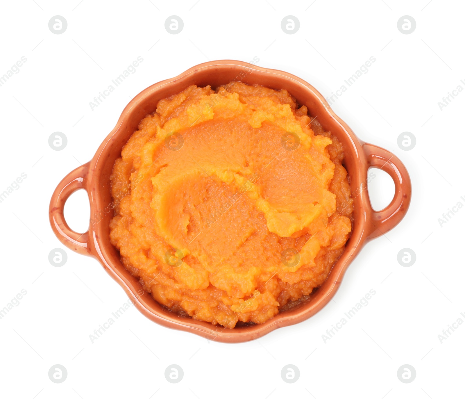 Photo of Tasty mashed sweet potato in pot isolated on white, top view