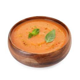 Photo of Delicious sweet potato soup with spices and basil in bowl isolated on white