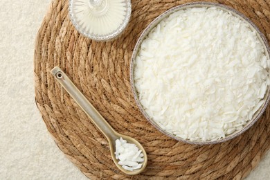 Photo of Soy wax on white textured table, top view