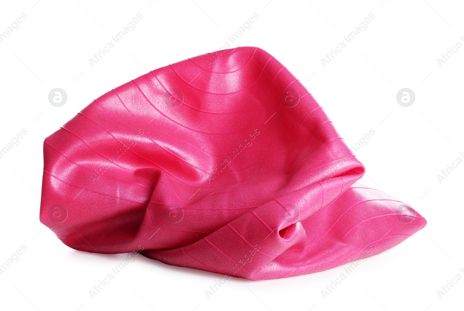 Photo of One deflated pink fitness ball isolated on white