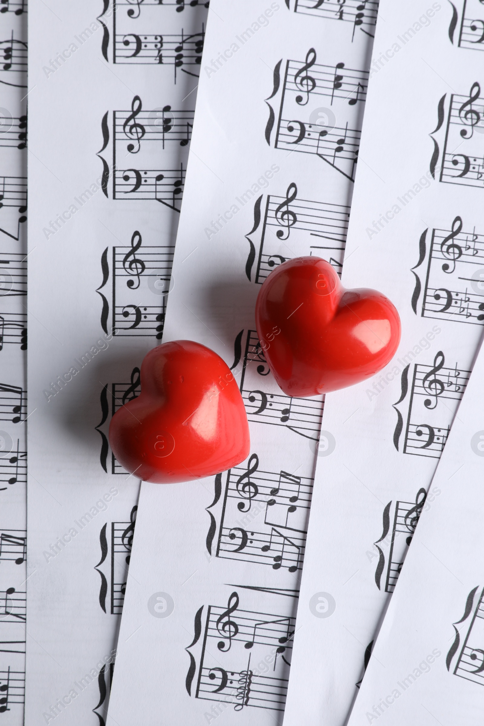 Photo of Heart figures on musical note sheets, top view